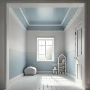 A small room painted in soft, light colors like pale blue or white